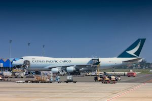 Cathay Pacific Cargo aircraft being loaded at airport