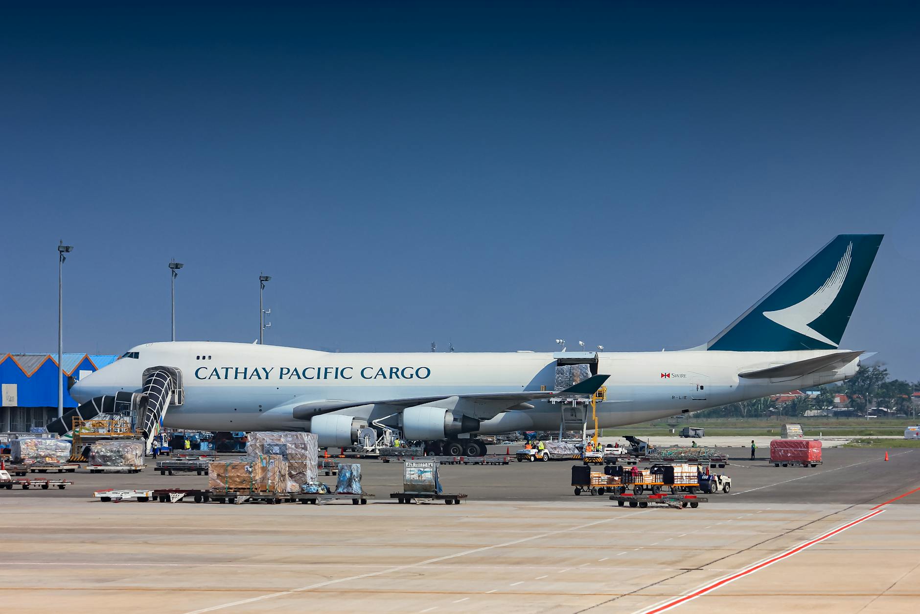 Cathay Pacific Cargo aircraft being loaded at airport