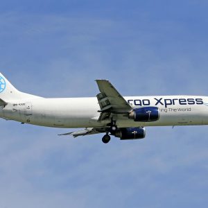 Cargo airplane flying against clear sky - air freight rates rising in April 2026 what shippers need to know