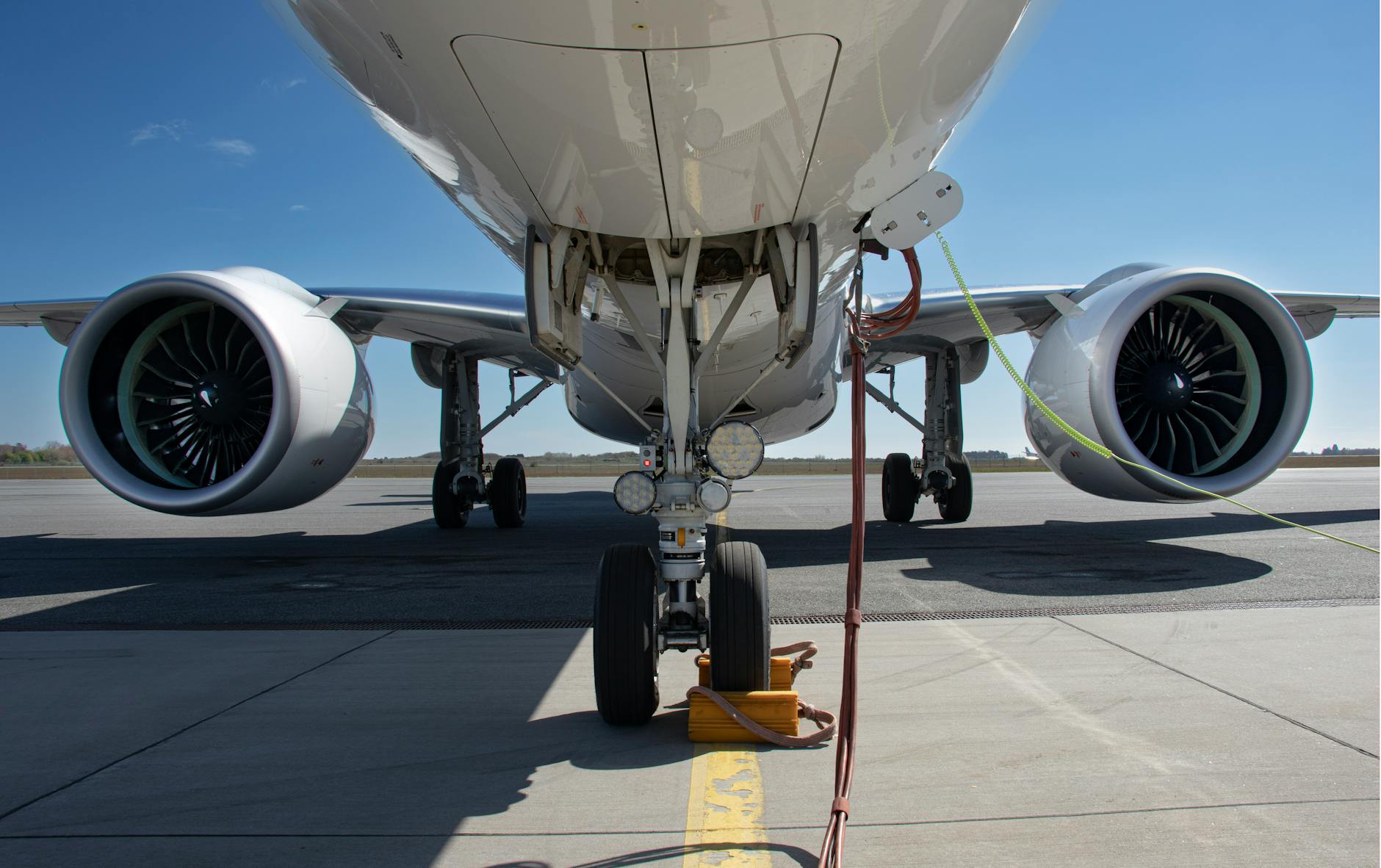 Detailed view of commercial airplane underside with landing gear