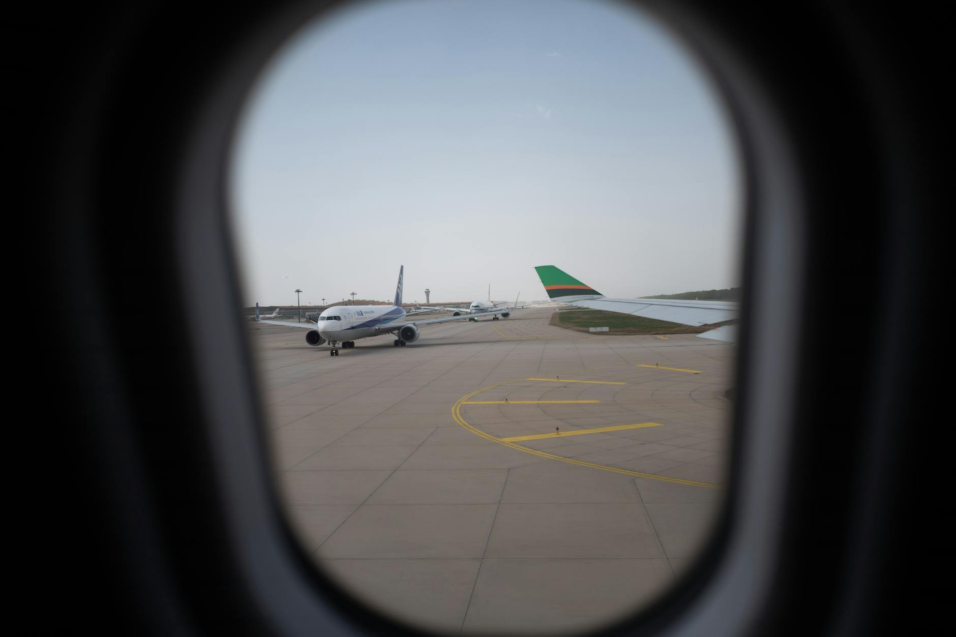 Airplane on airport runway — airBaltic air freight cargo services