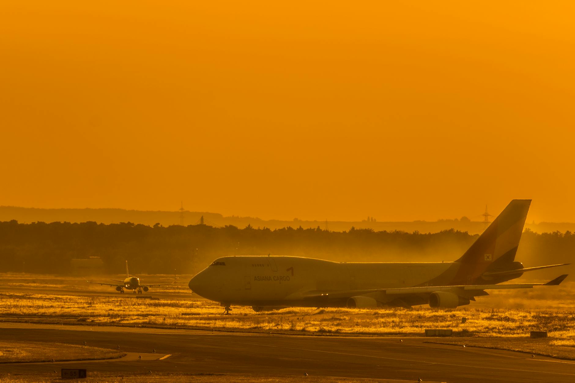 Boeing 747 freighter aircraft on runway at sunset - new air cargo routes and services launched spring 2026