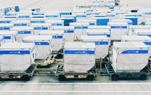 Aerial view of cargo containers at airport terminal