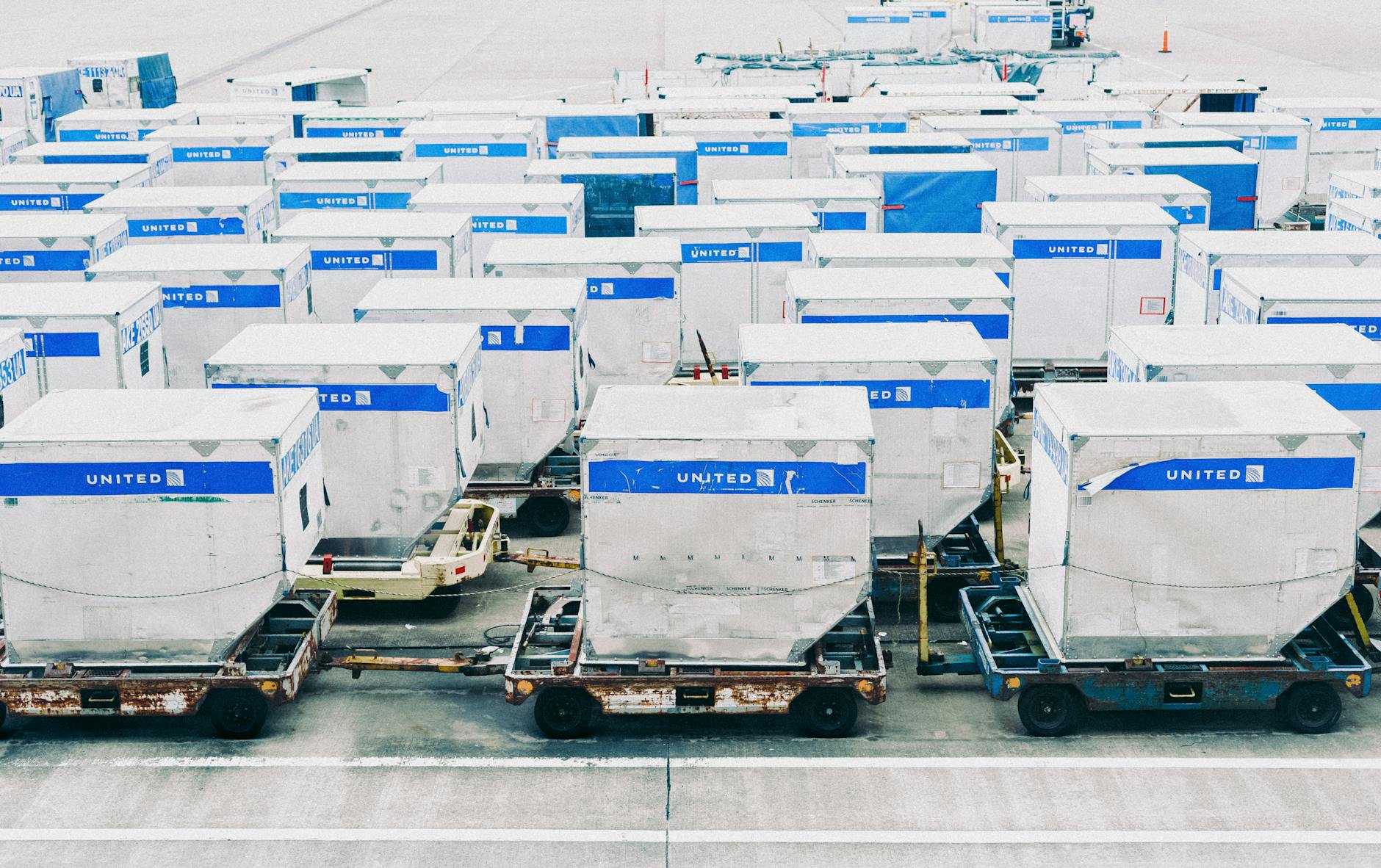 Aerial view of cargo containers at airport terminal
