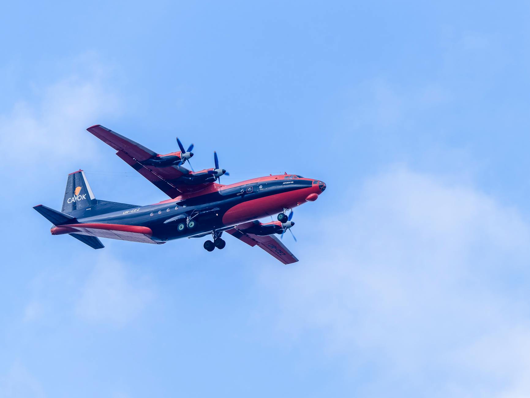 Transpacific eastbound air cargo trends with a cargo plane at sunset