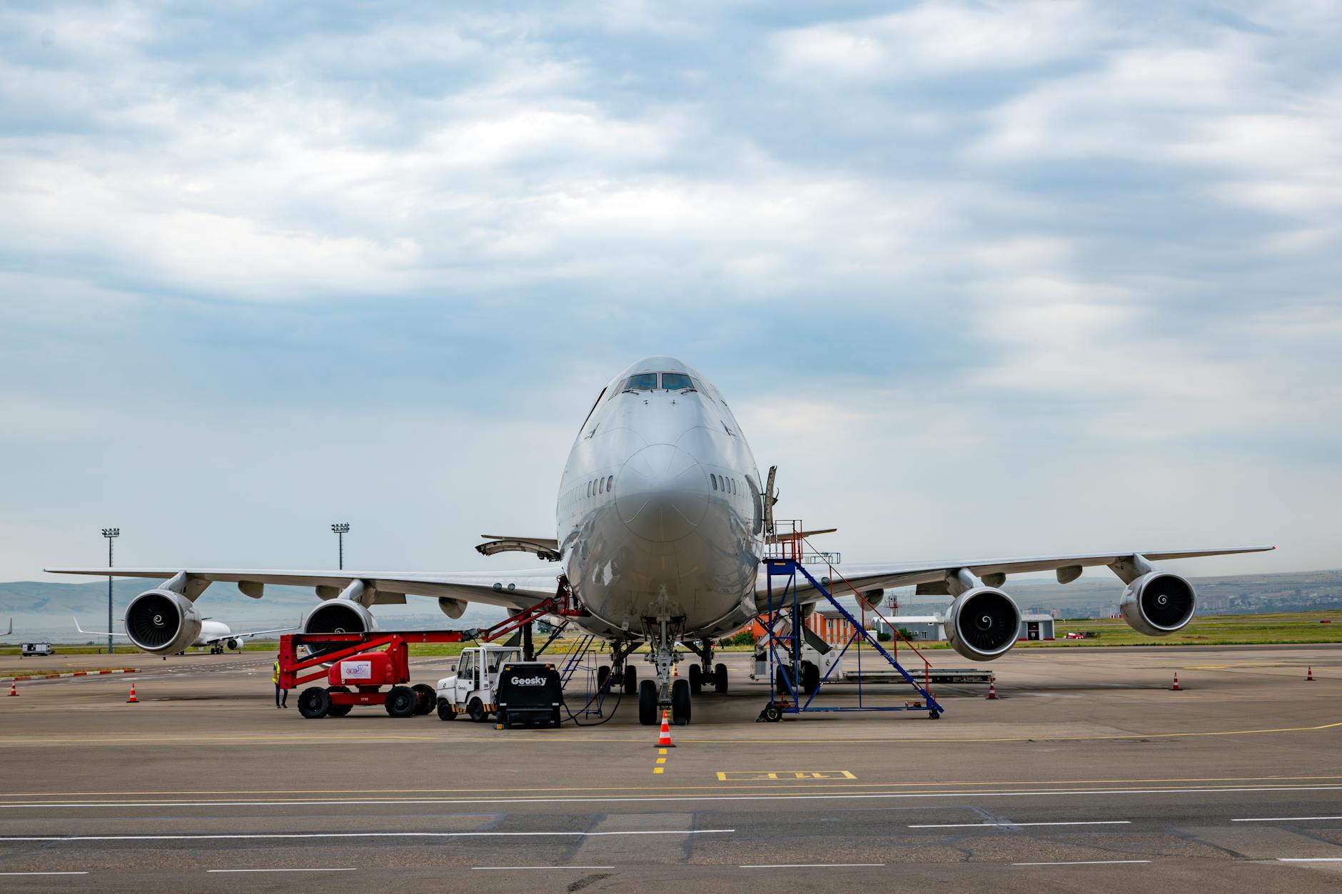 Boeing 747 cargo plane at airport gate — air cargo rates surge amid global turmoil
