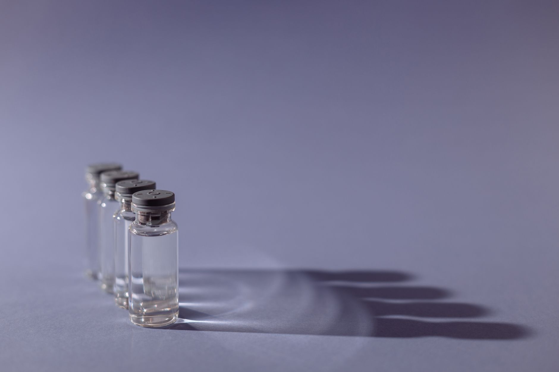 Laboratory setting with pharmaceutical vials and cold chain logistics